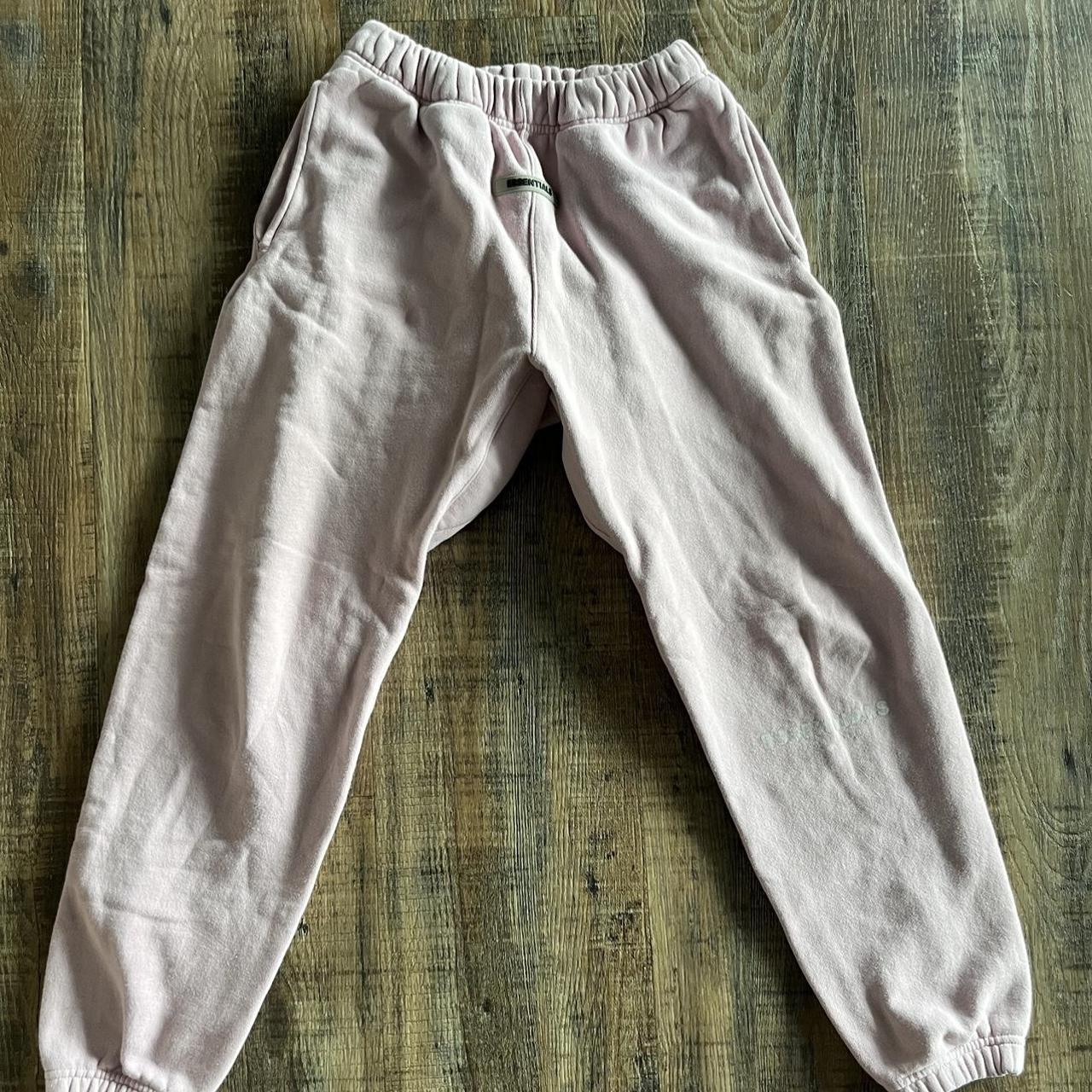 Small pink essentials sweet pants lightly used - Depop