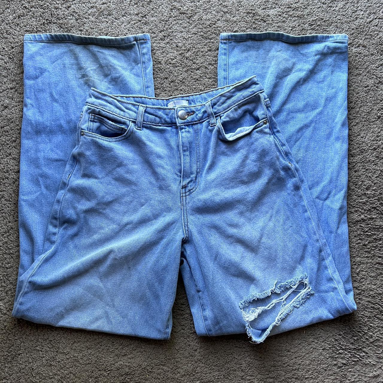 Baggy blue distressed jeans , worn with a few grass... - Depop