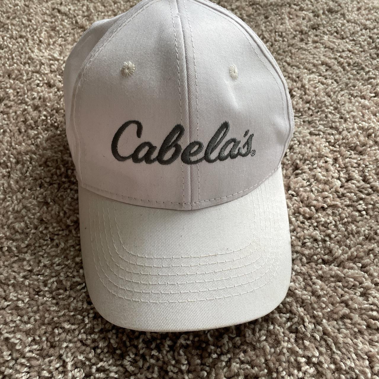 White Cabelas hat it's adjustable. A few stains - Depop