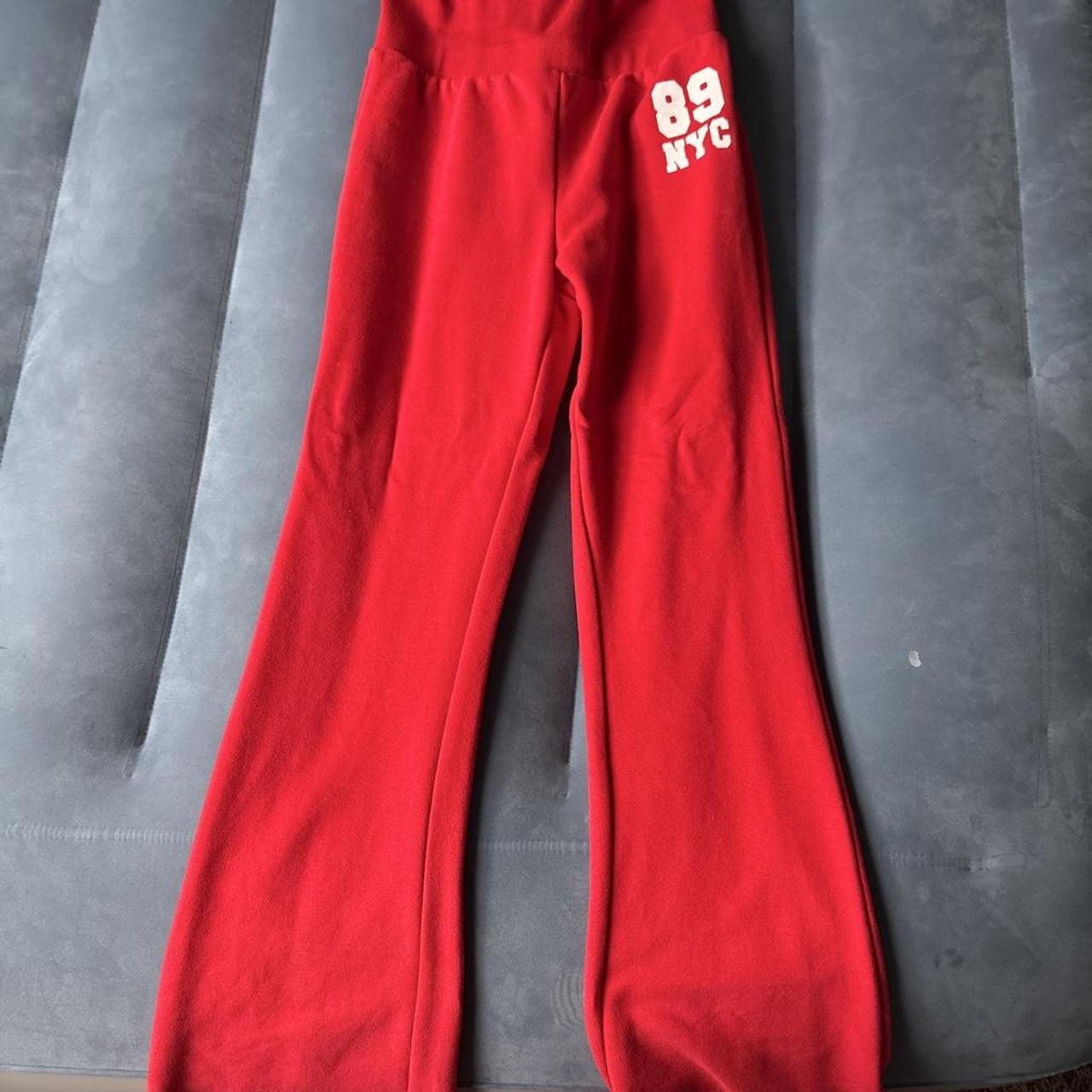 ...lost girls' red joggers tracksuits