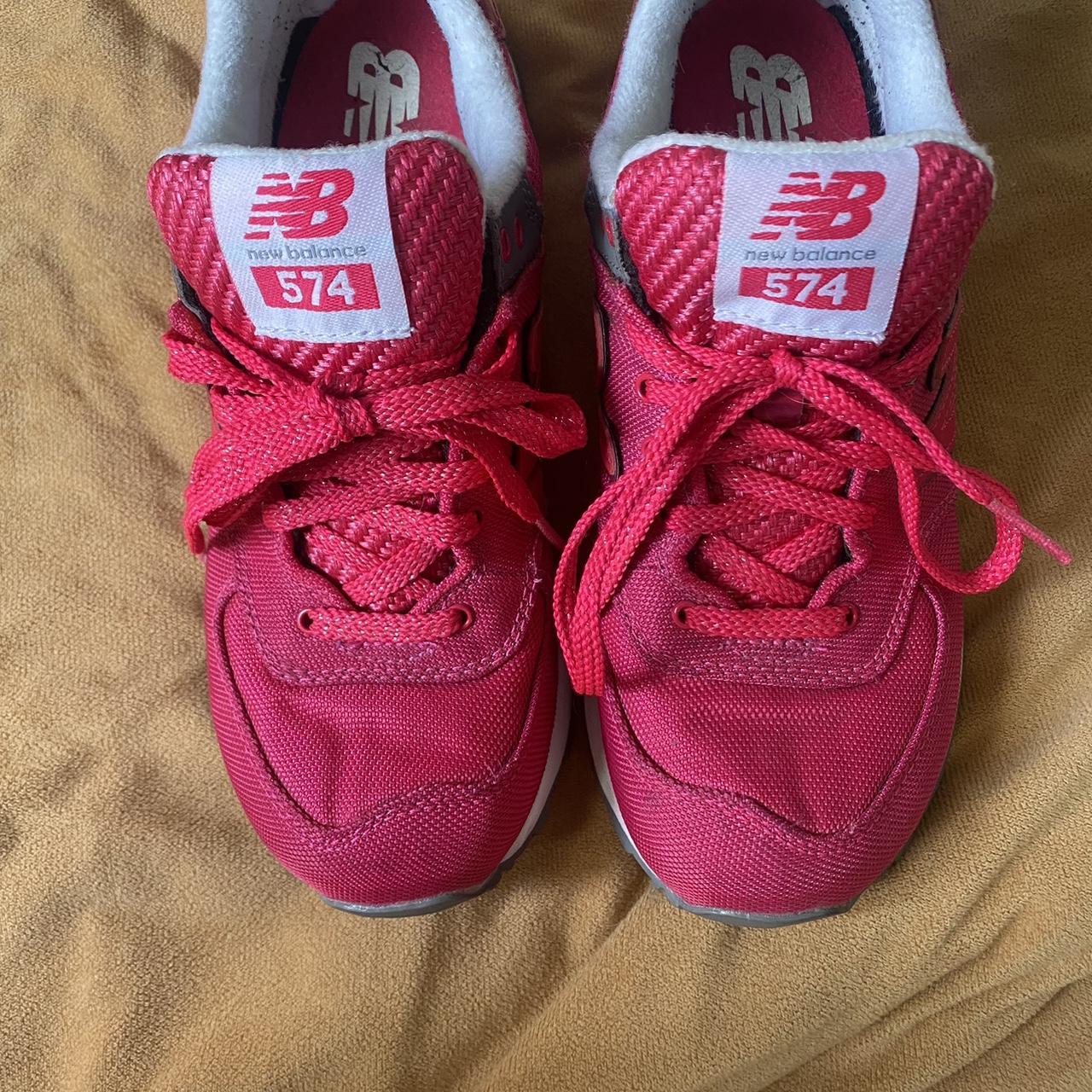 Bright pink shop new balance trainers