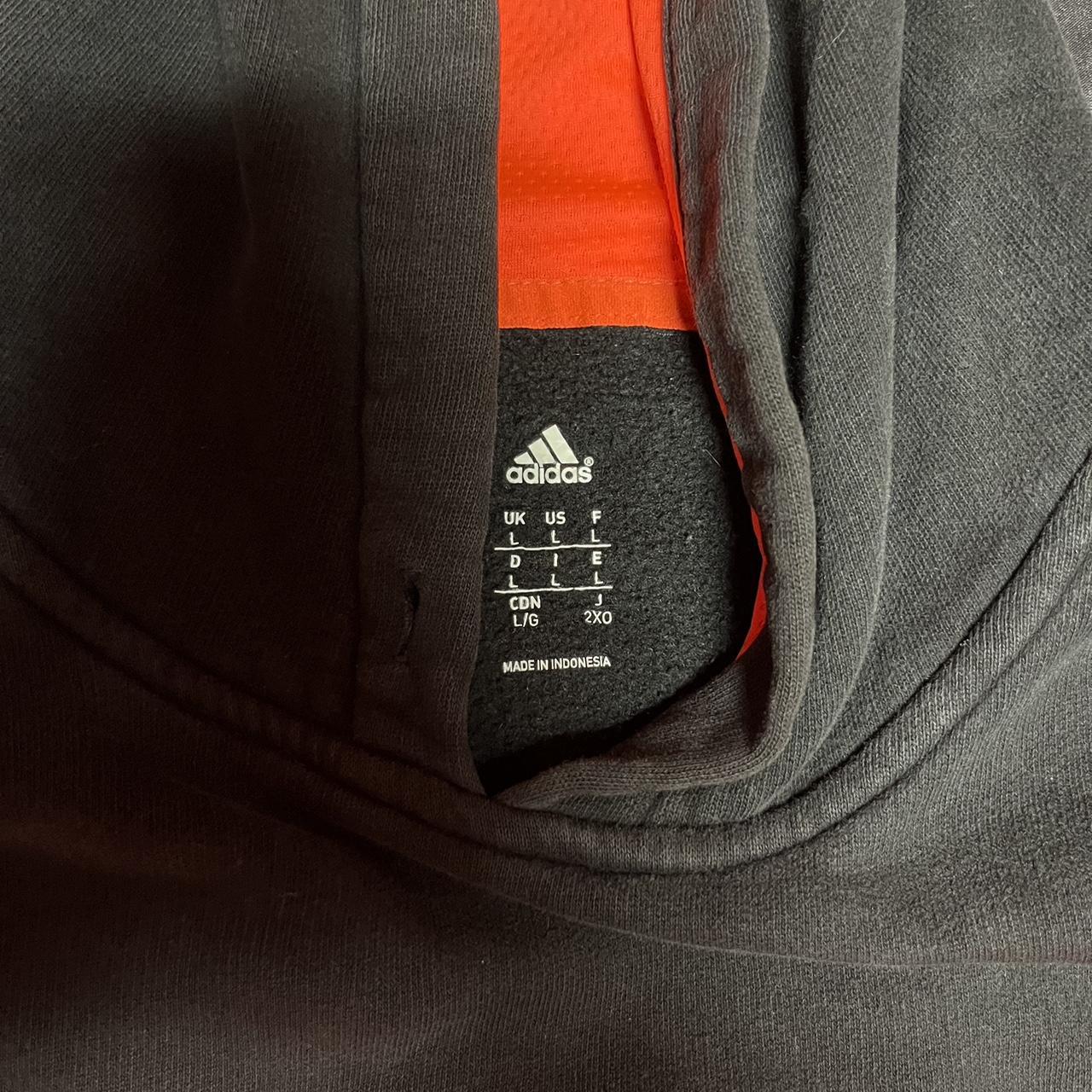 Adidas black and orange/red logo hoodie:Large (small... - Depop