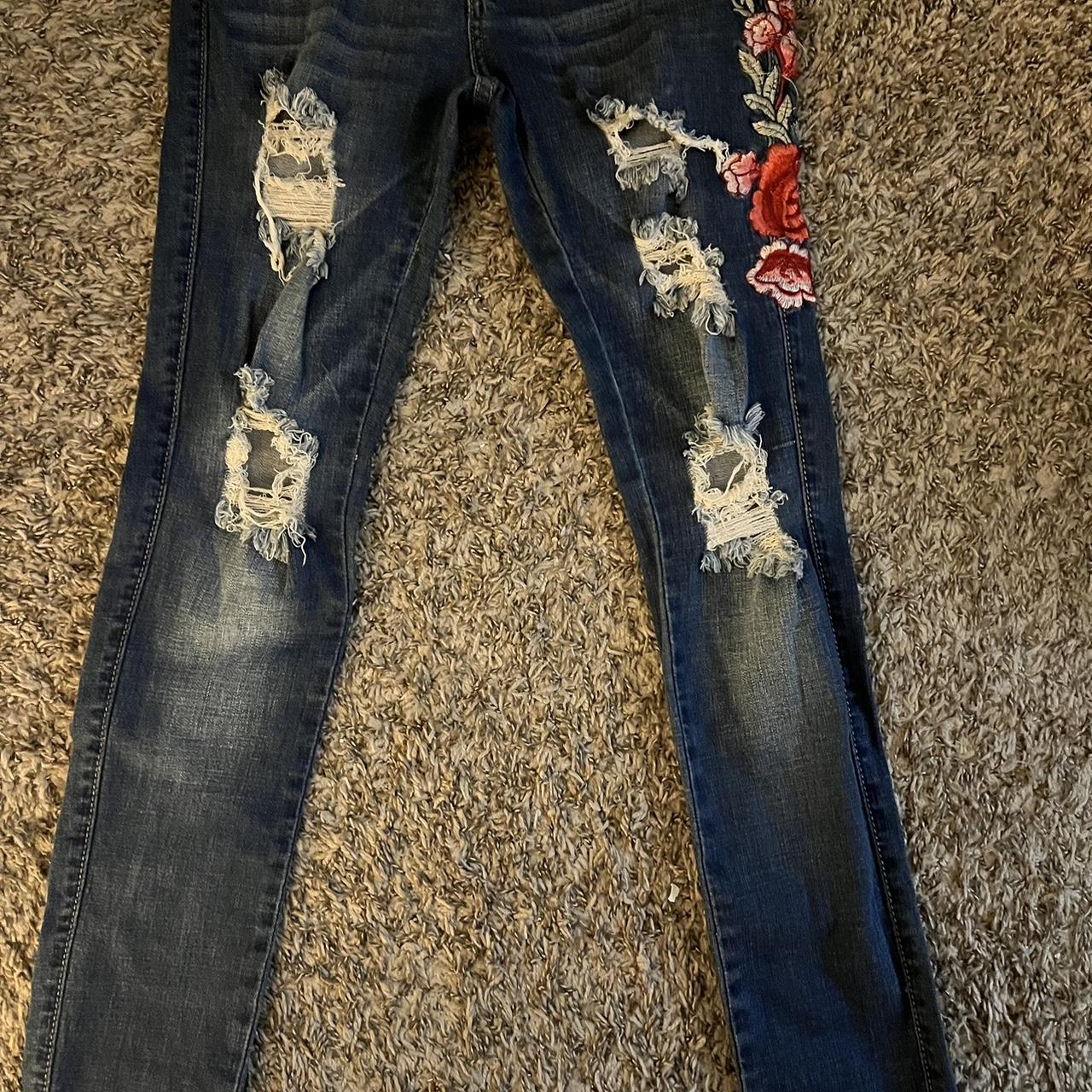 Rose sales ripped jeans