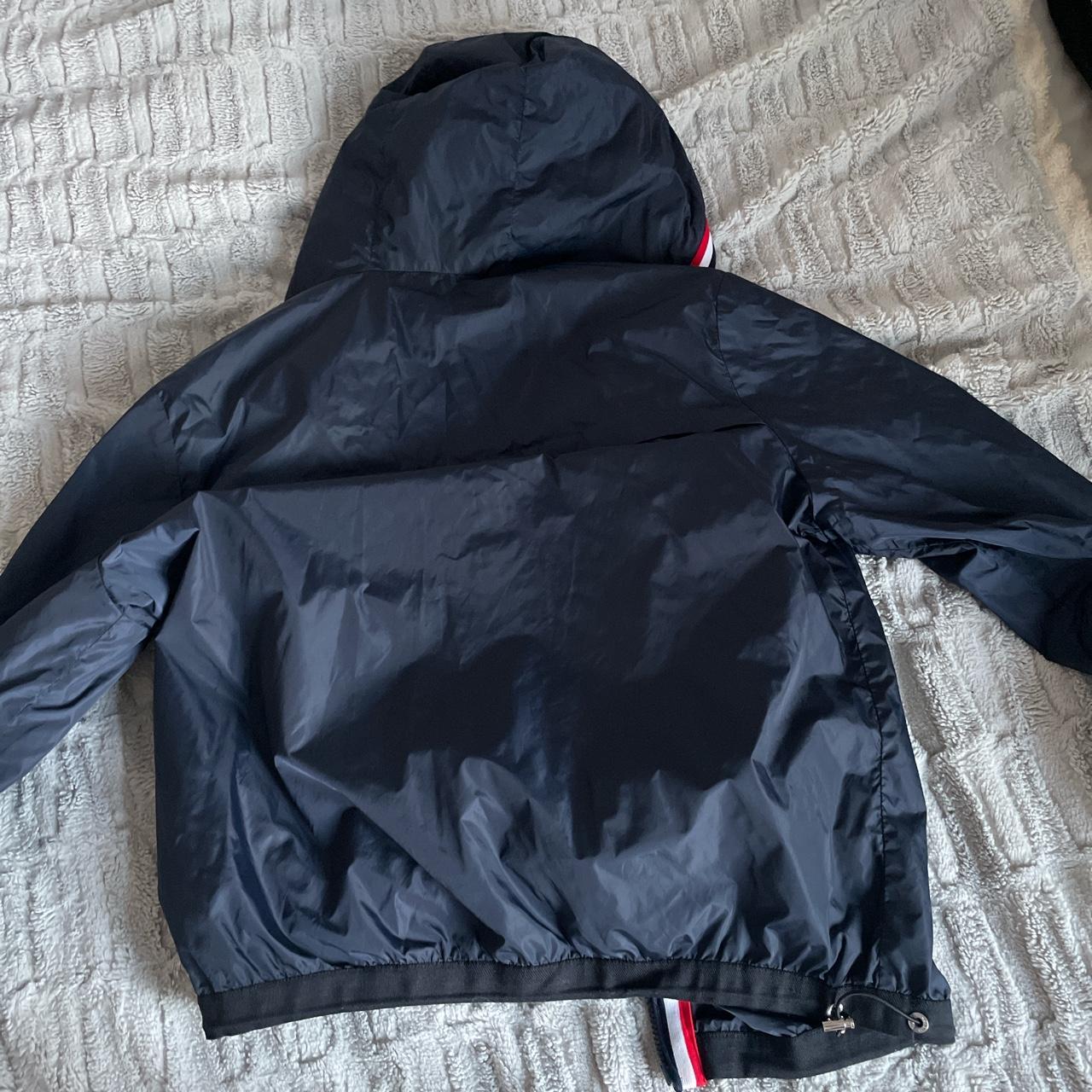 Small Navy Moncler raincoat. - Depop