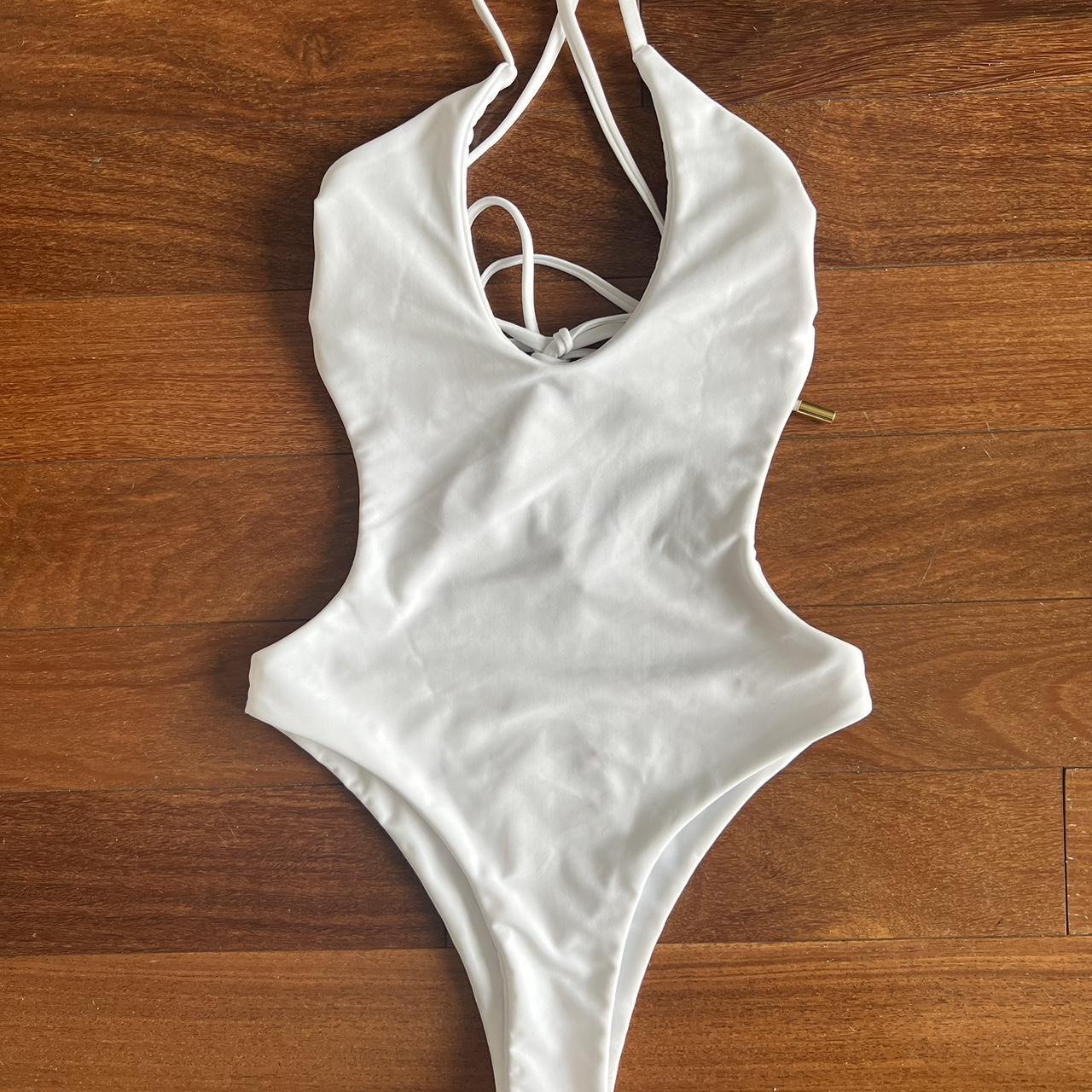 White One Piece. Straps can be crossed in the front... - Depop