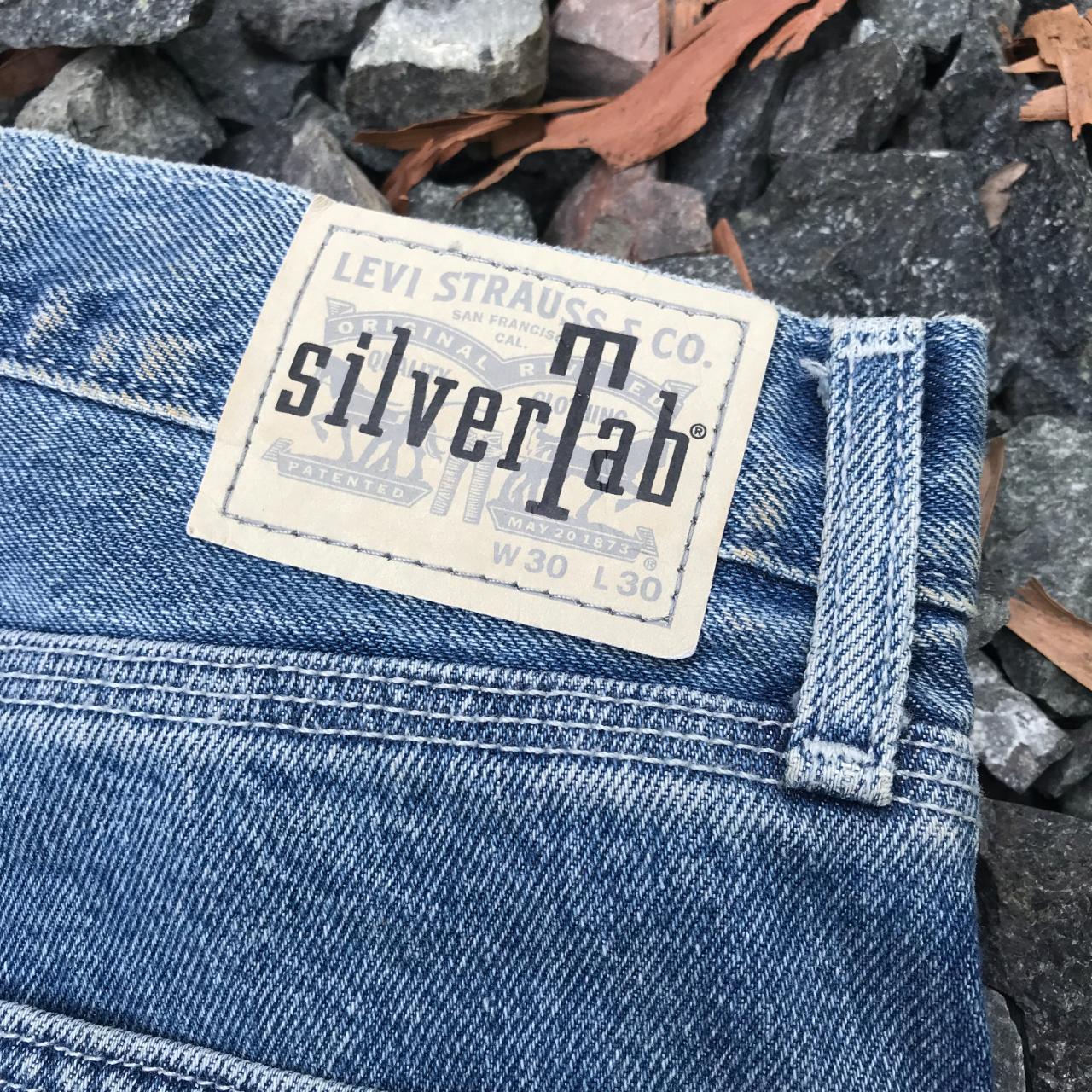 Item: Vintage Levis Silvertab baggy loose carpenter... - Depop