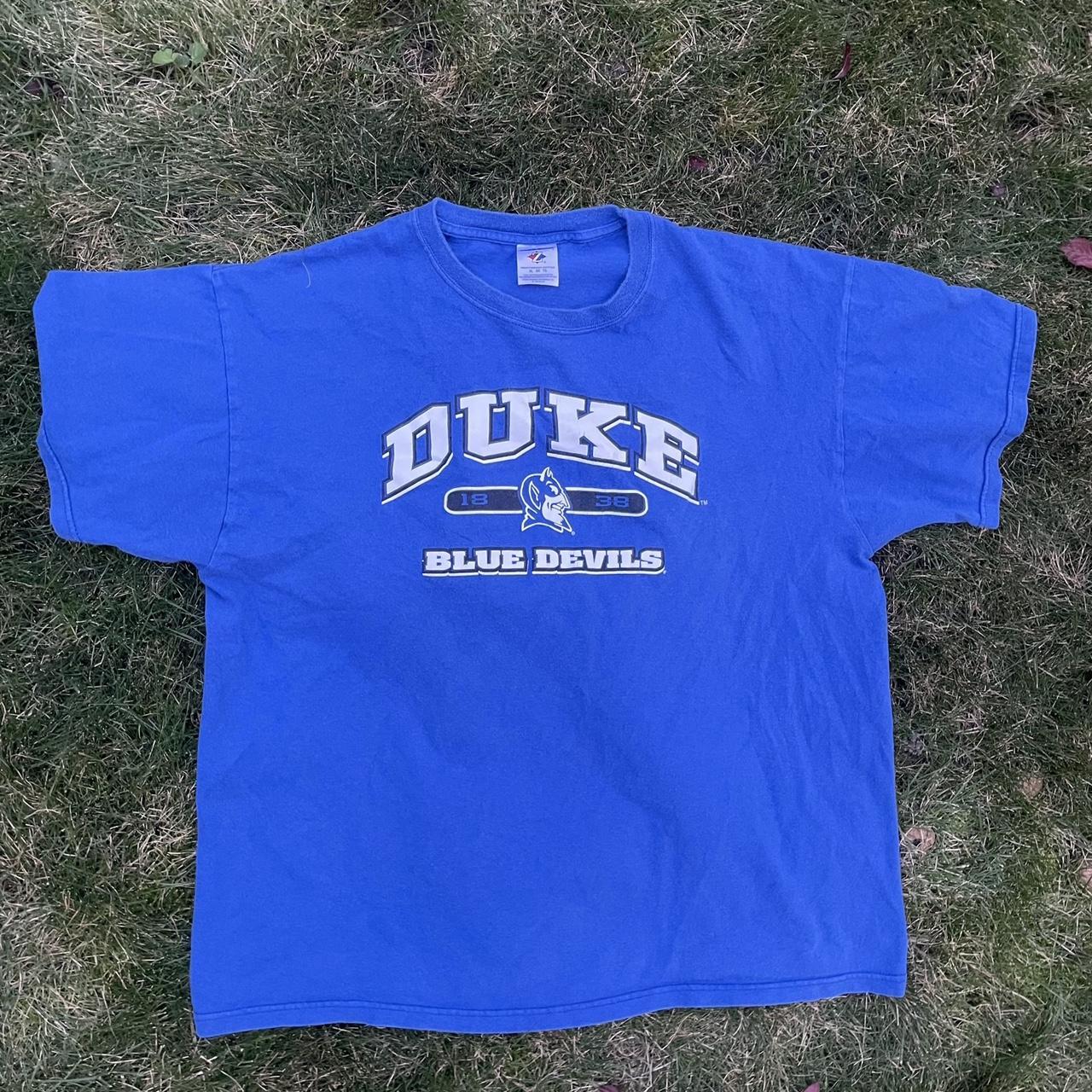 university blue dunks shirt