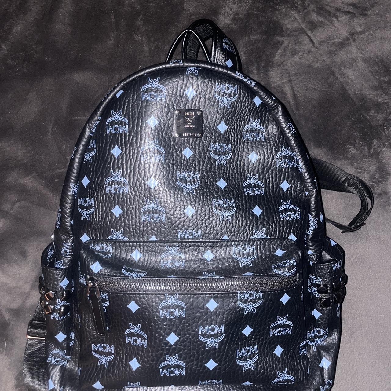 Black and shop blue mcm backpack