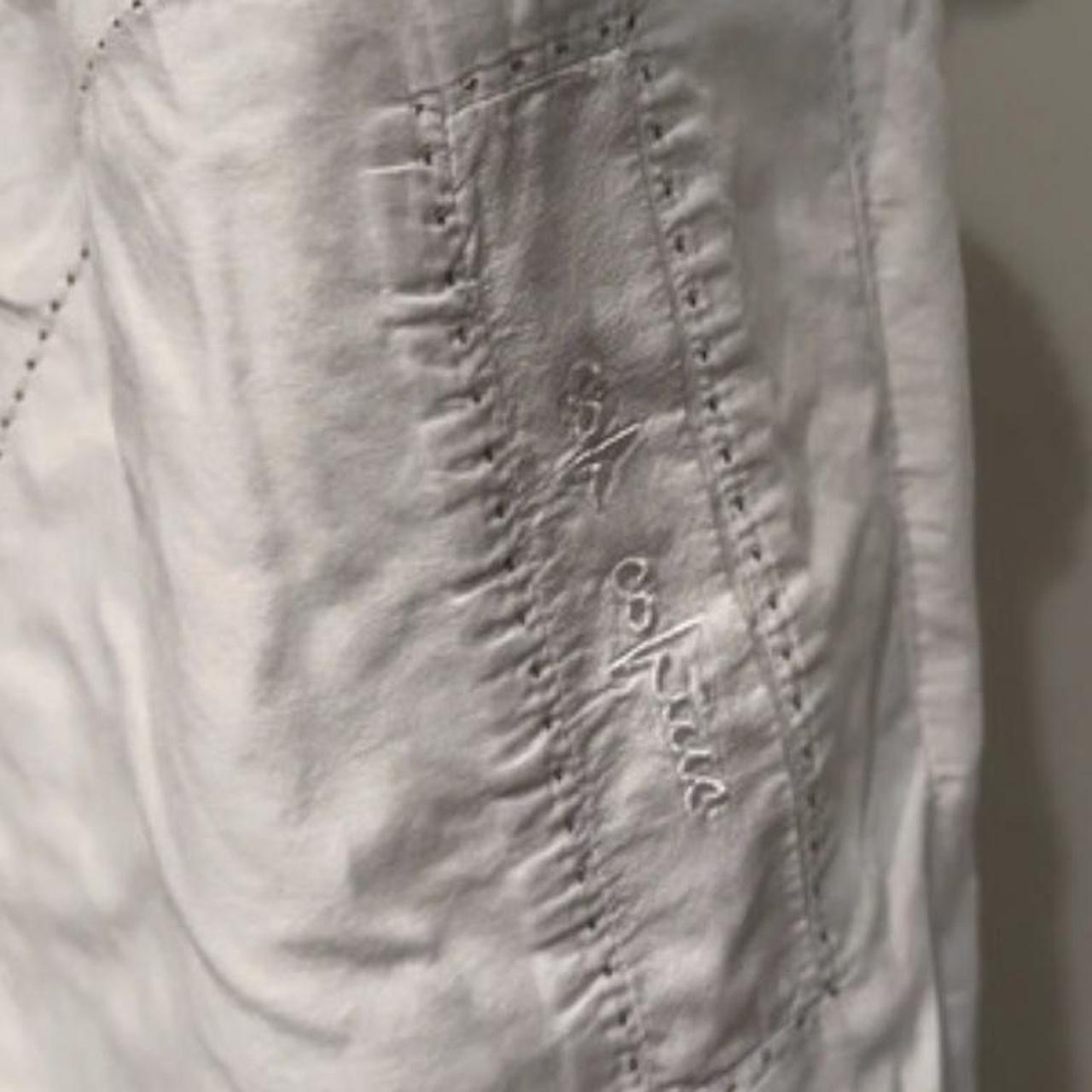 As brand new! Cop Copine milkmaid style top with Cop... Depop