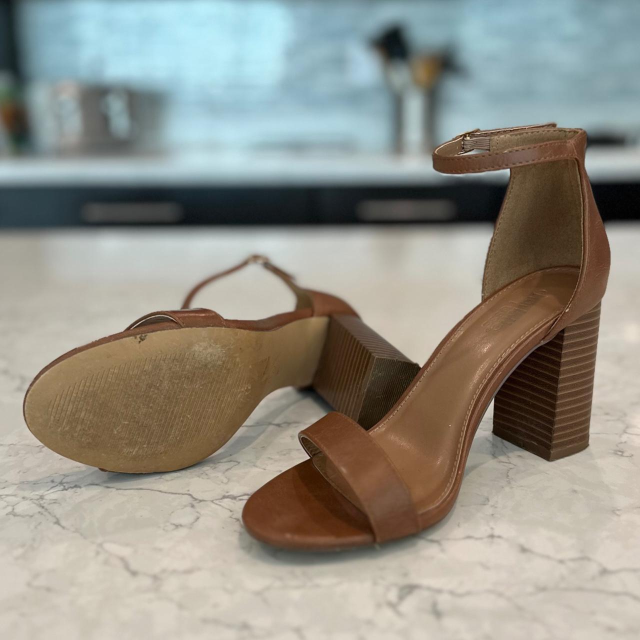 The perfect classy brown wedge heel. Lightly used,... - Depop