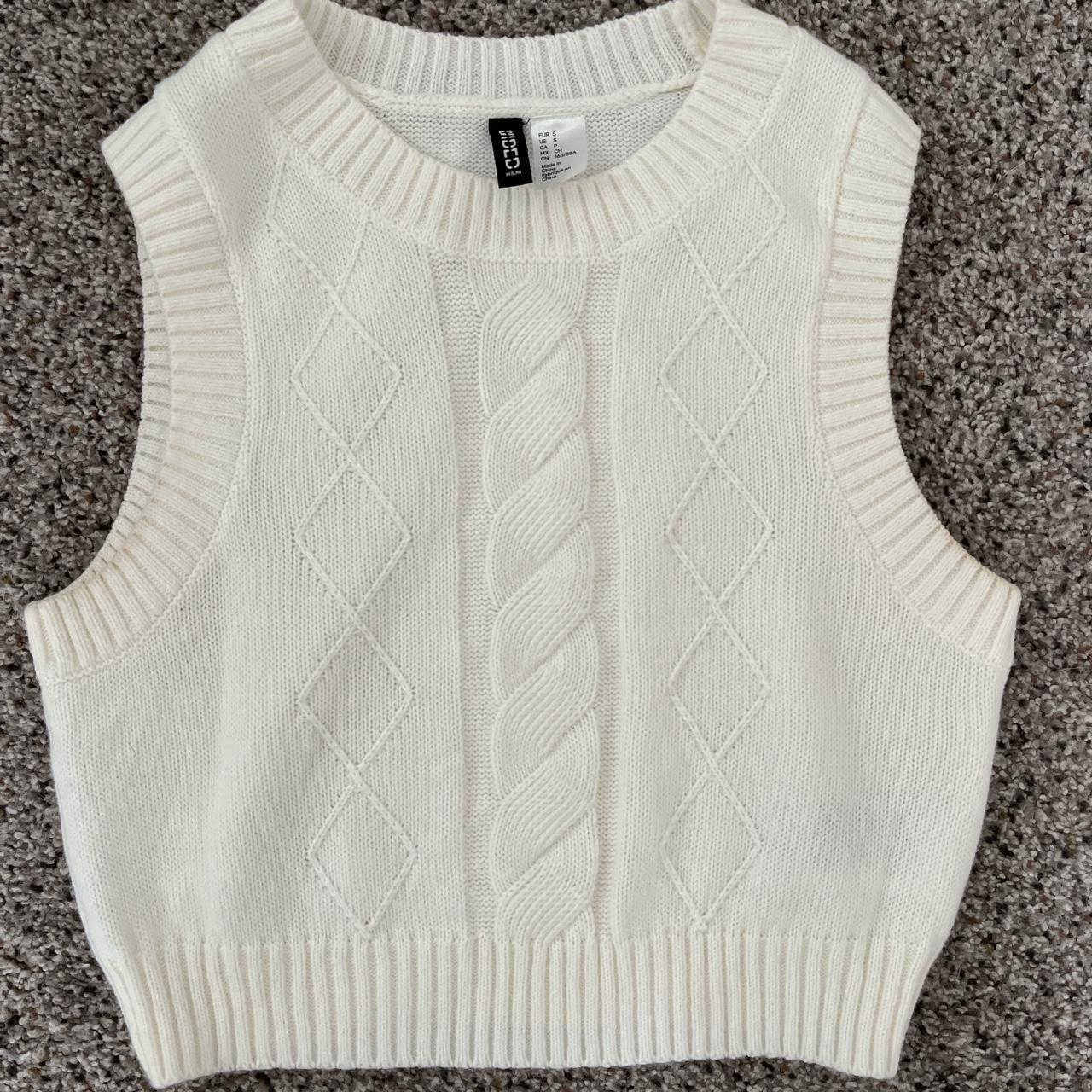 small cable knit sweater vest. has some fading... - Depop