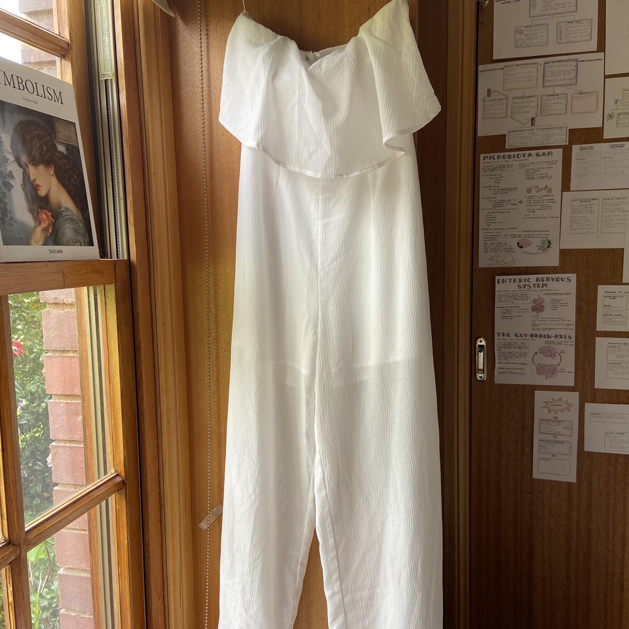 size 6 Luvalot white strapless jumpsuit boned. Depop