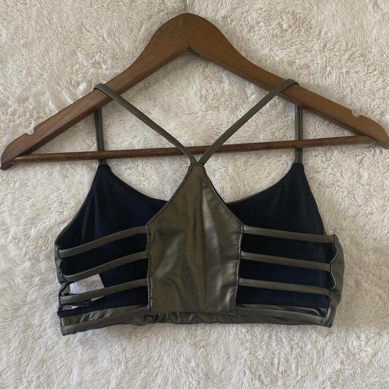 Onzie dark green bra top size S/M, fits more like... Depop