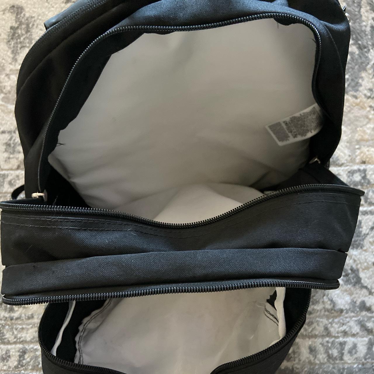 black jansport backpack has a rip in the side... - Depop