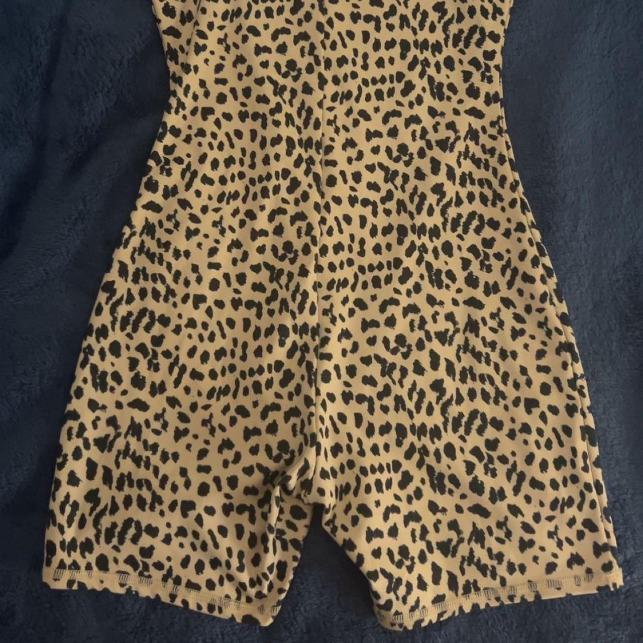 Tan and black american eagle leopard print romper. Depop