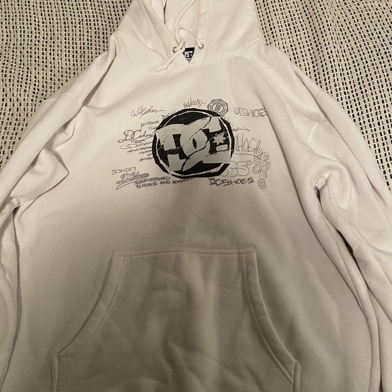 Dc hoodie White Brand new besides small red stain on... - Depop