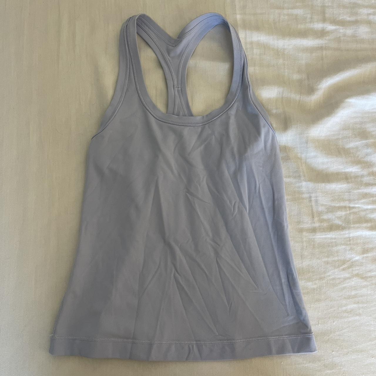 Nulu waist-length, racer back, size 4 lululemon tank... - Depop