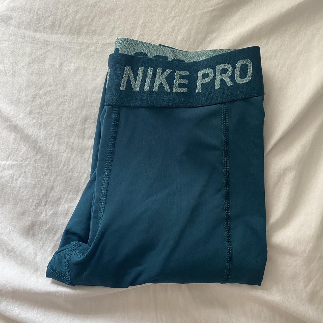 teal Nike Pro dri fit leggings size womens - Depop