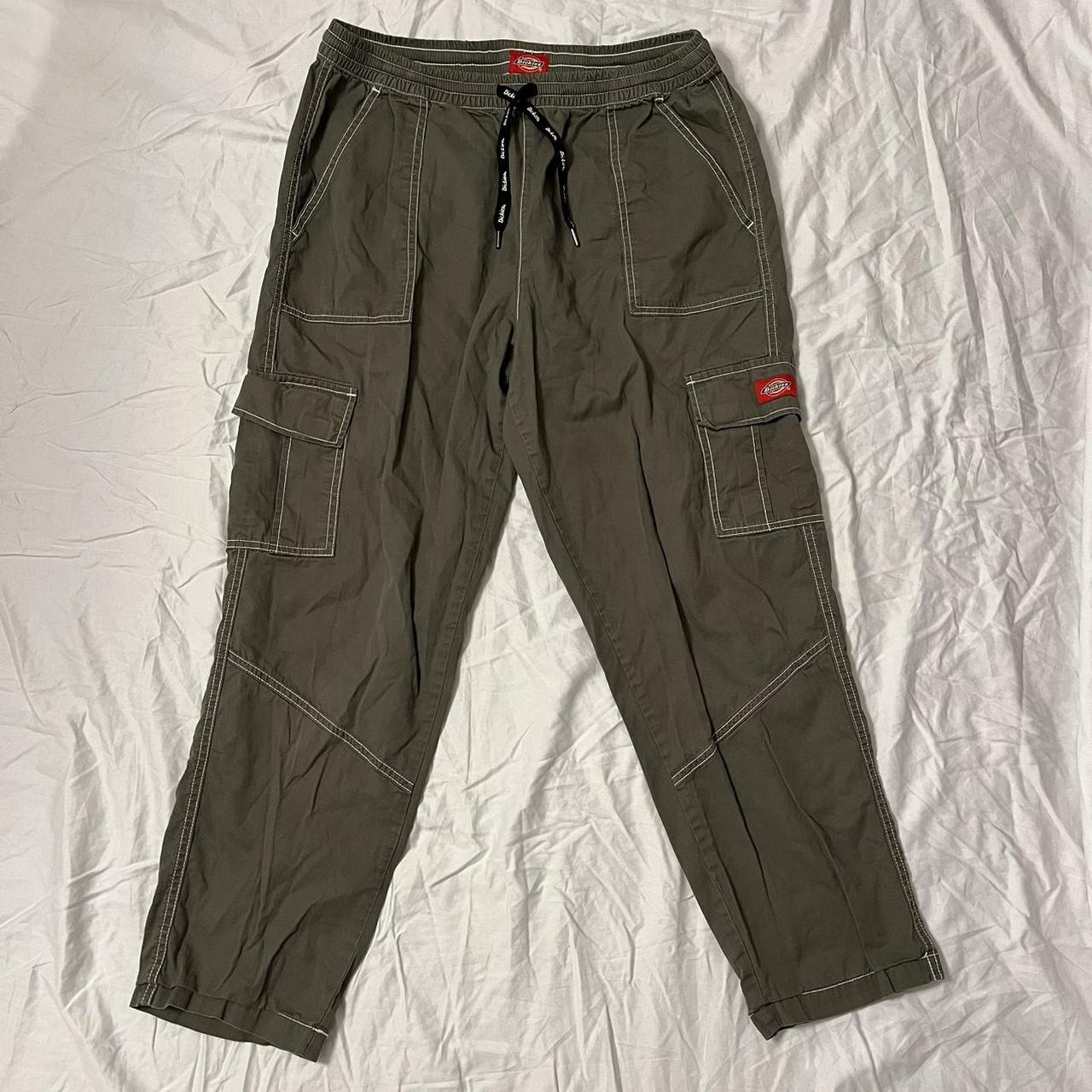 Olive green Dickies cargo pant with drawstrings... Depop