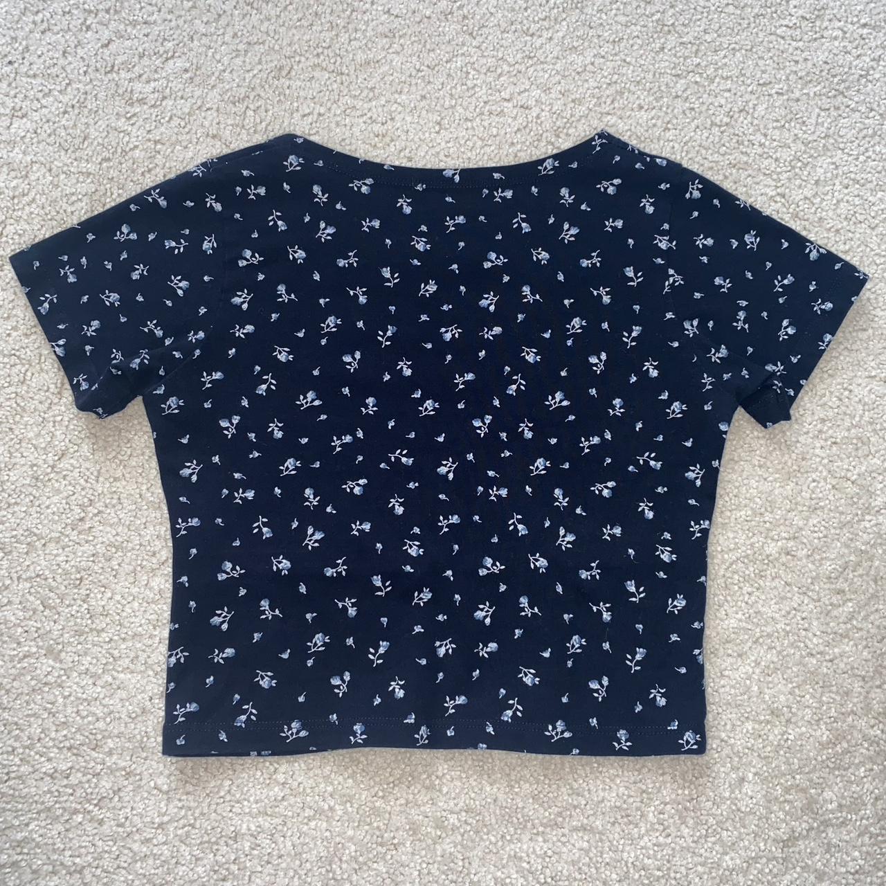 Brandy Melville navy blue floral Amara top Like new - Depop