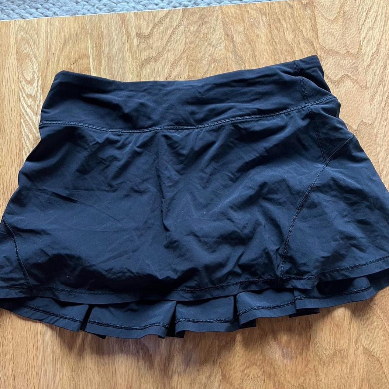 Short lululemon black skirt with ruffles on the back... - Depop