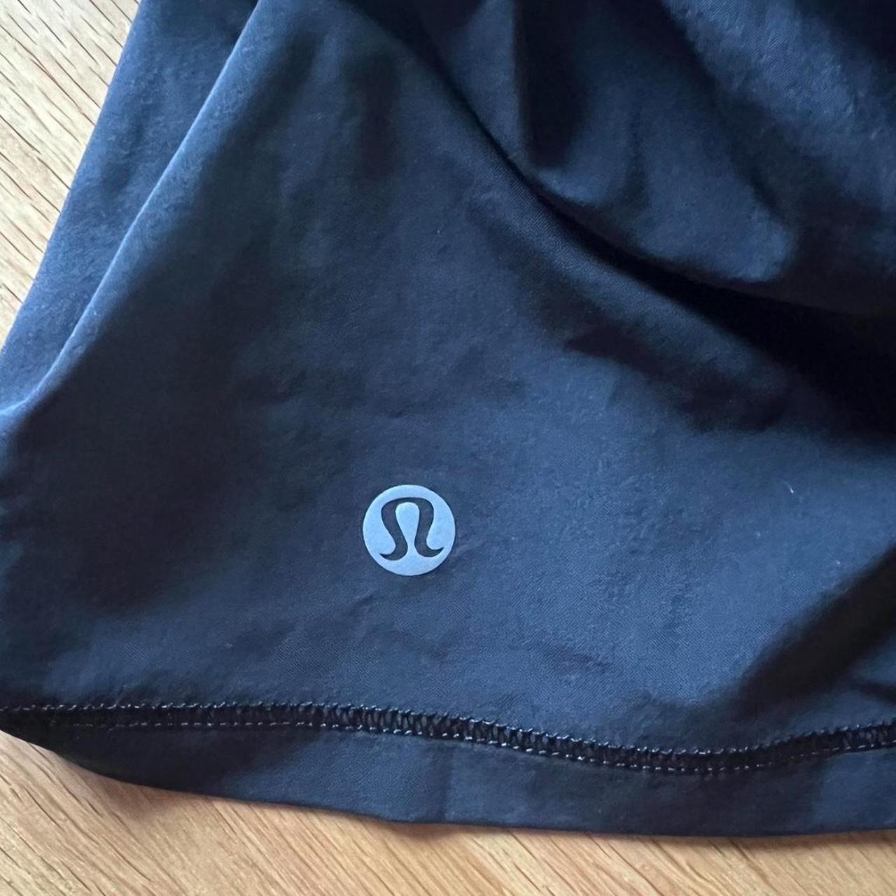 Short lululemon black skirt with ruffles on the back... - Depop