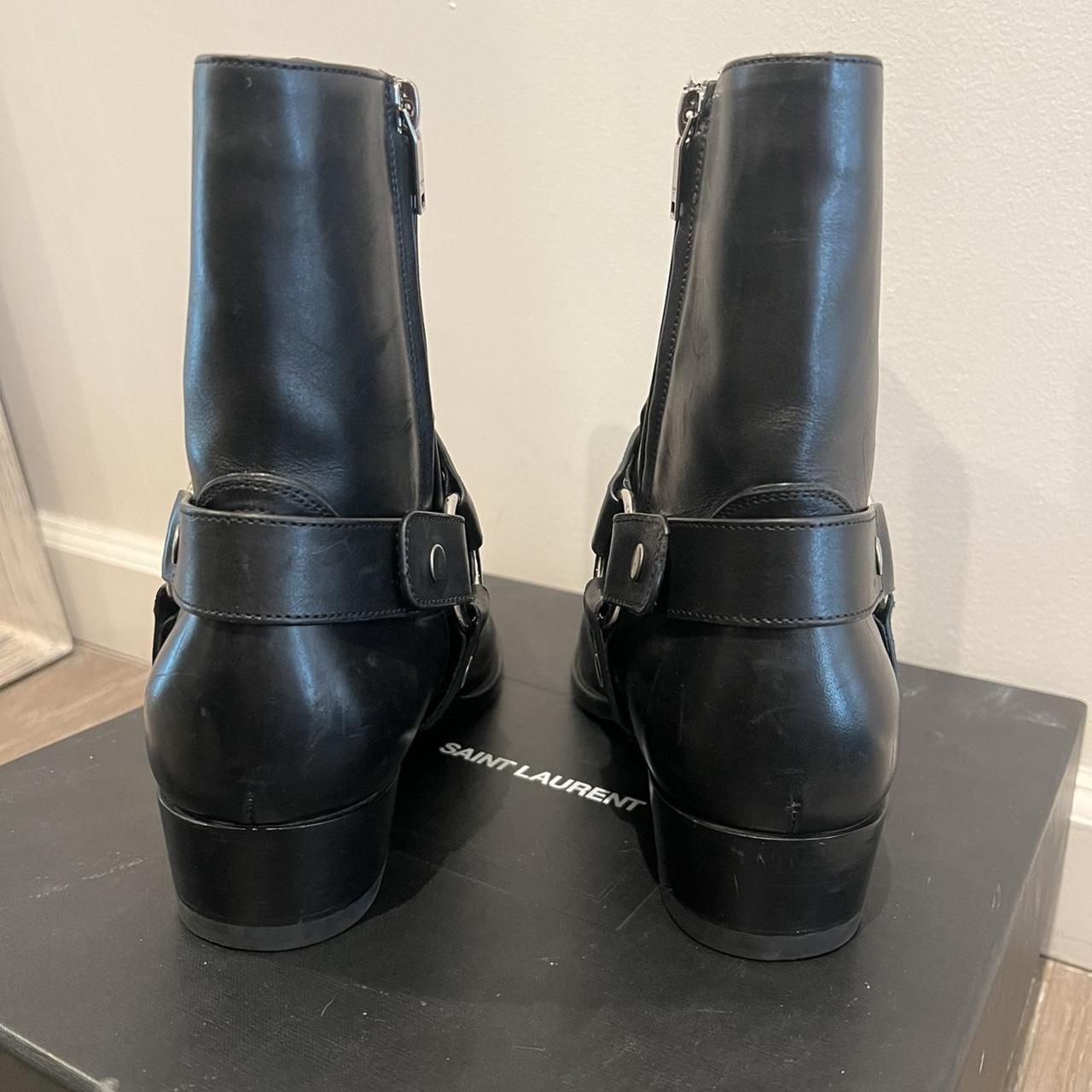 靴 Yves Saint Laurent harness boots Saint Laurent Wyatt Harness Boot in Noir | FWRD