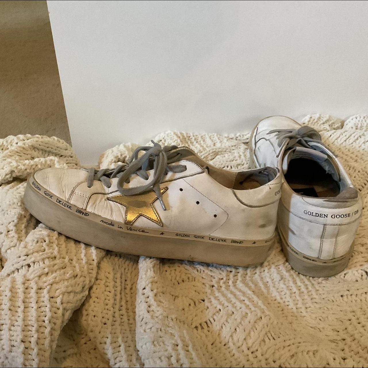 Golden Goose Women's White and Gold Trainers
