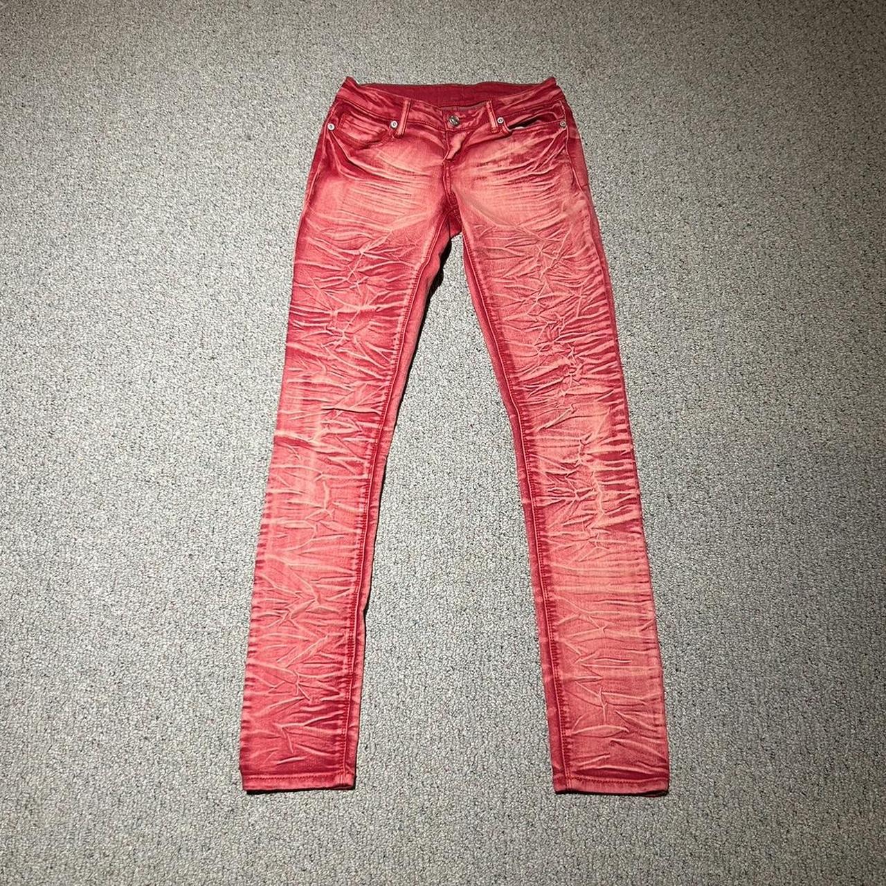Faded red Y2K skinny jeans, great