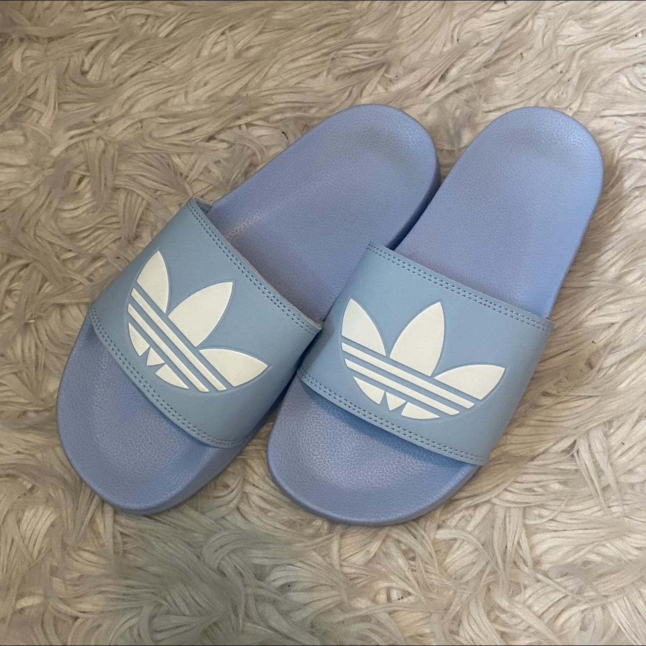 Baby blue hotsell adidas slides