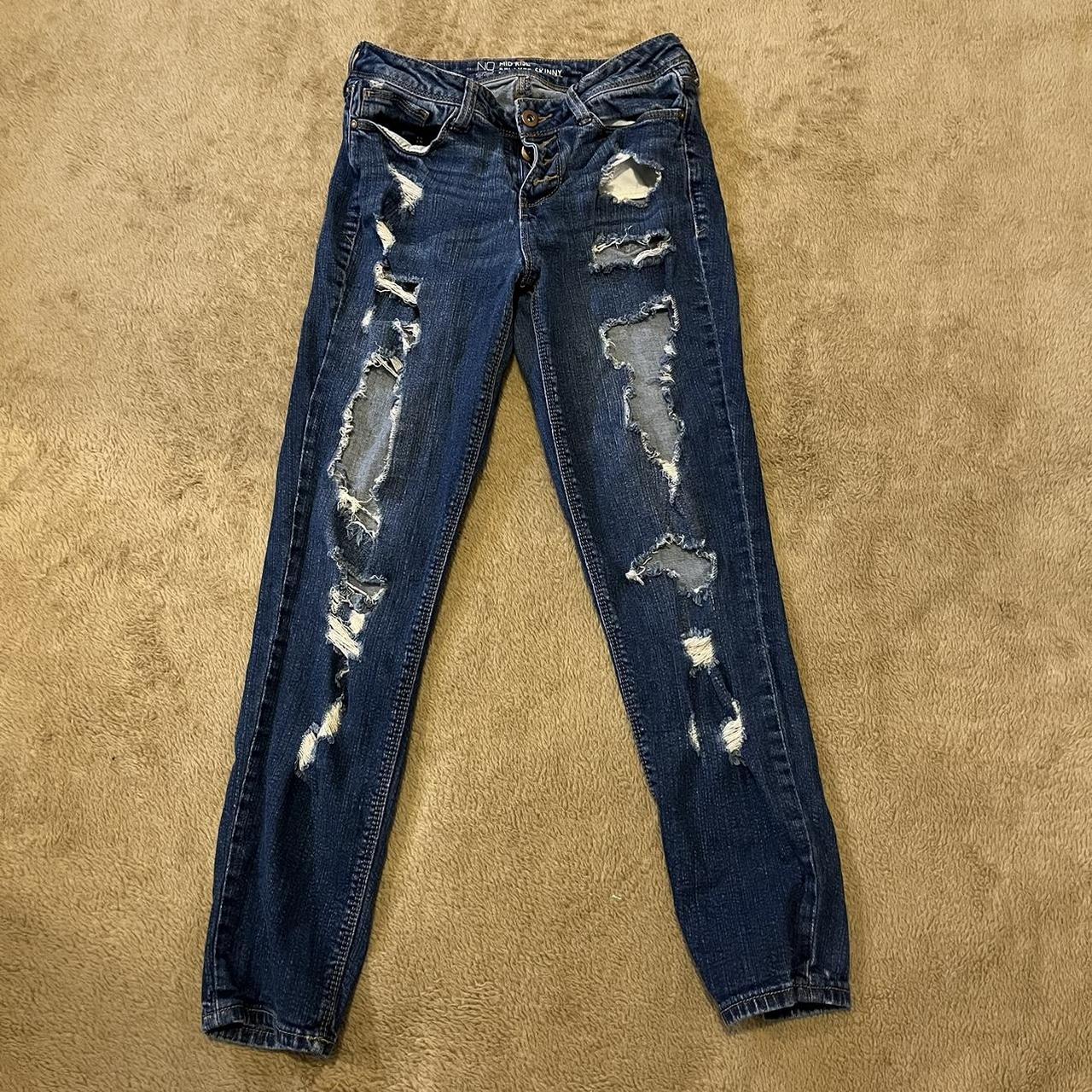 No Boundaries mid rise relaxed skinny ripped jeans - Depop