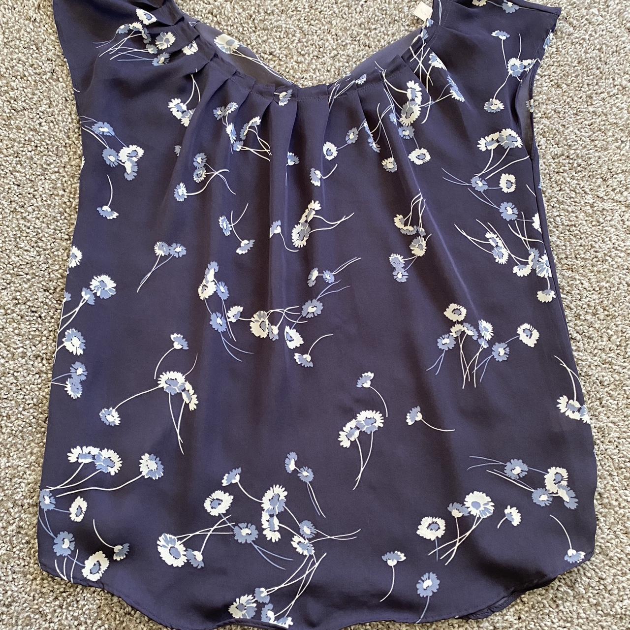 Blue floral Lauren Conrad blouse. Ties in the back... - Depop