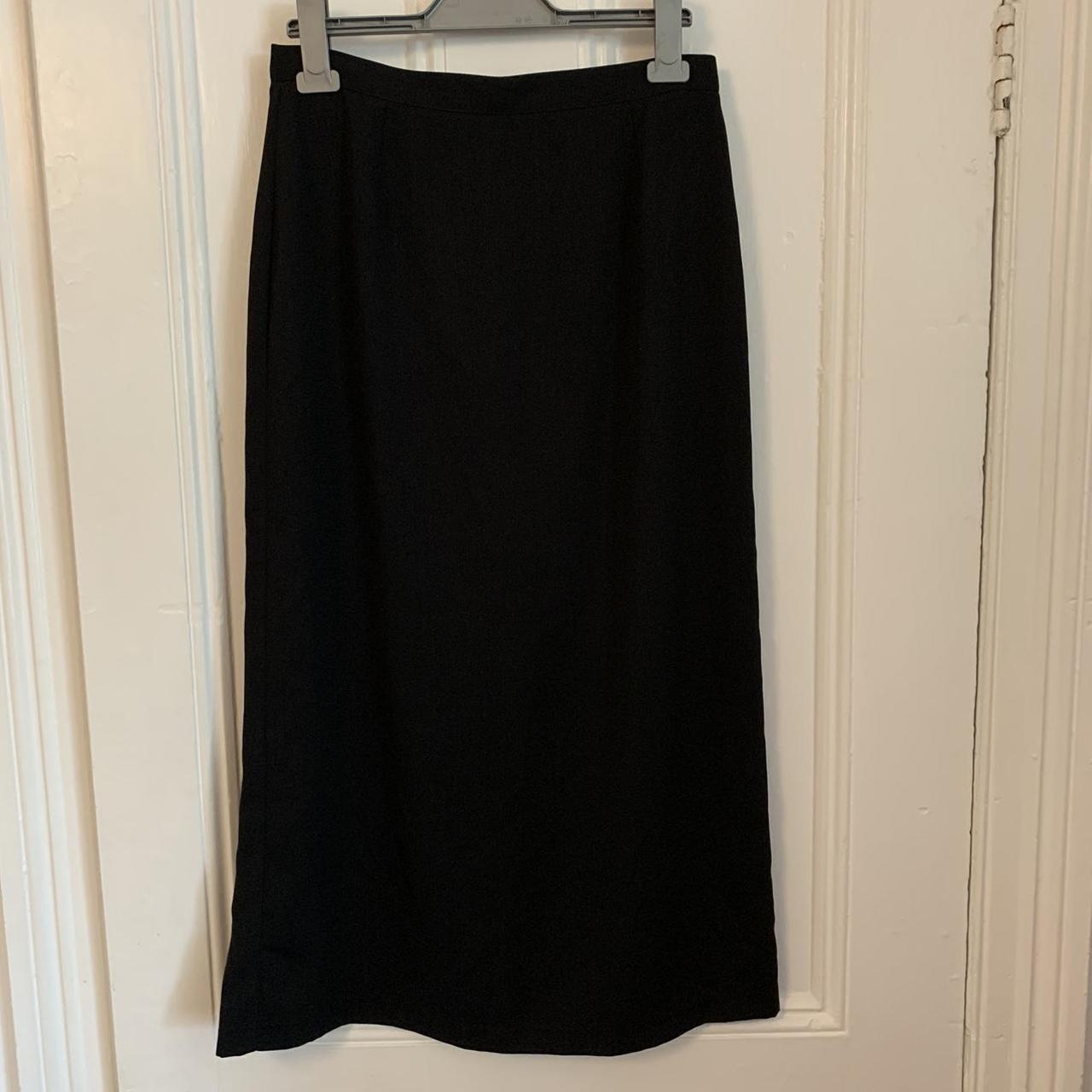 Long black skirt. Womens UK12. Loose fit. - Depop