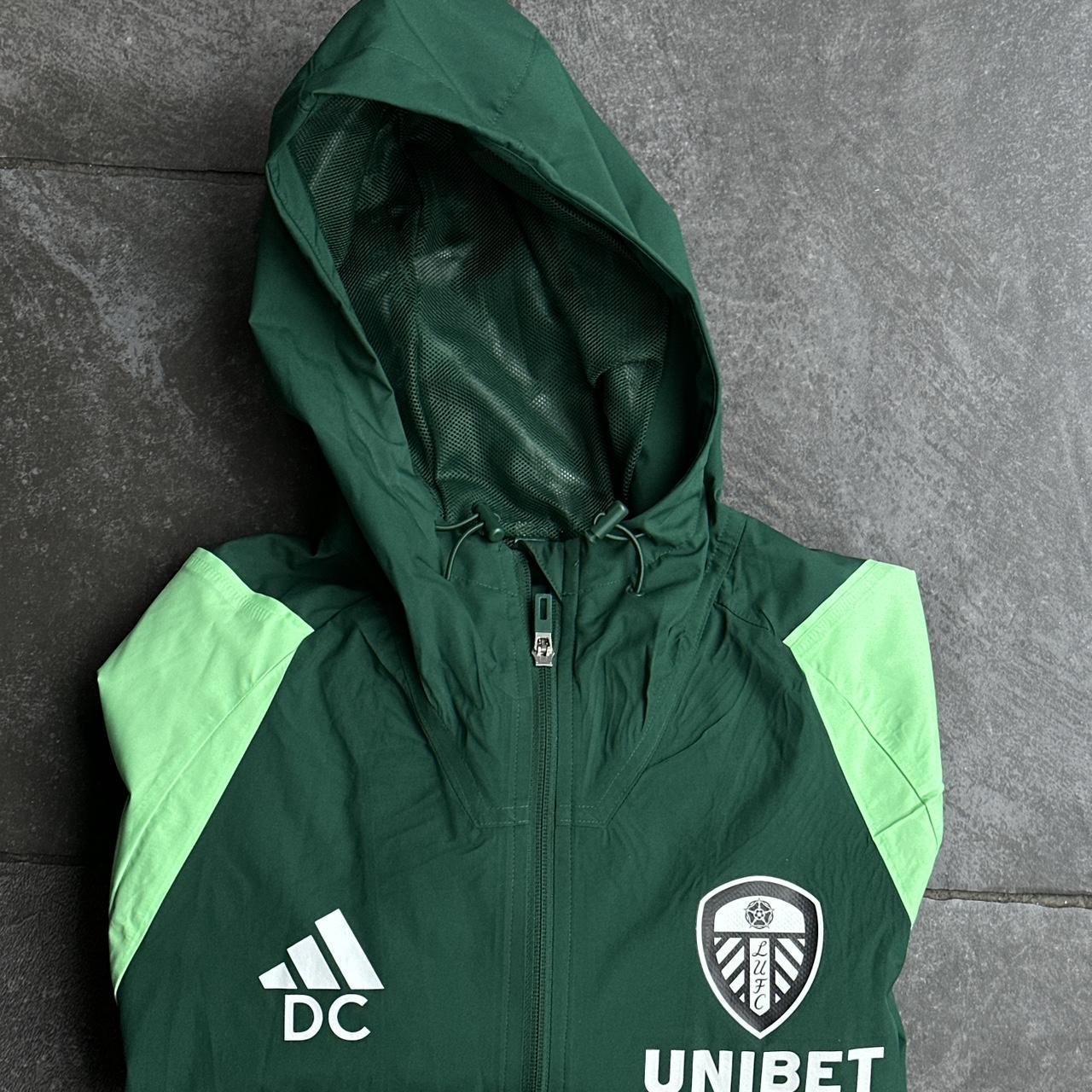 Leeds United green and white Adidas windbreaker  | Depop