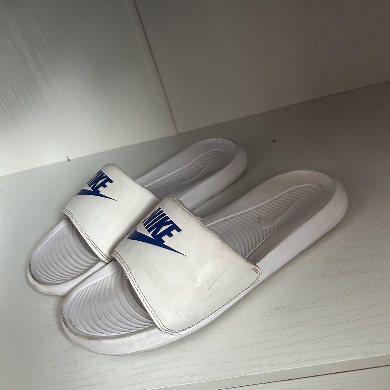 nike white and blue sliders