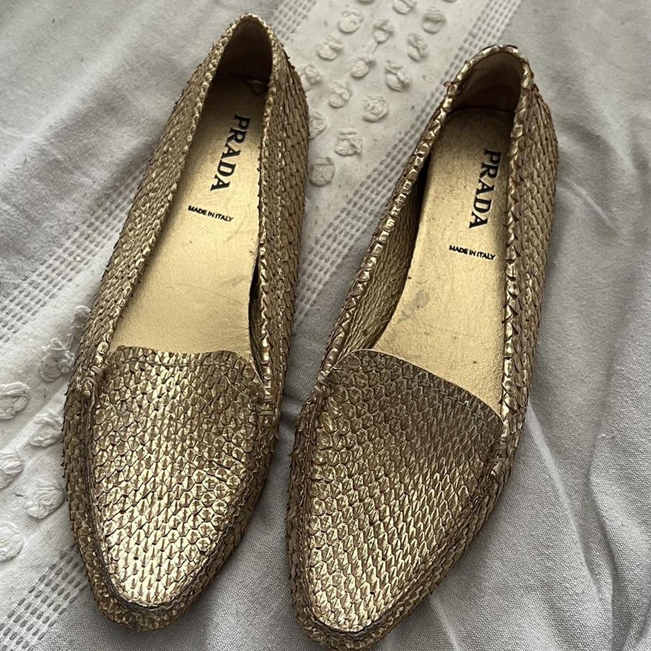 Prada store gold flats