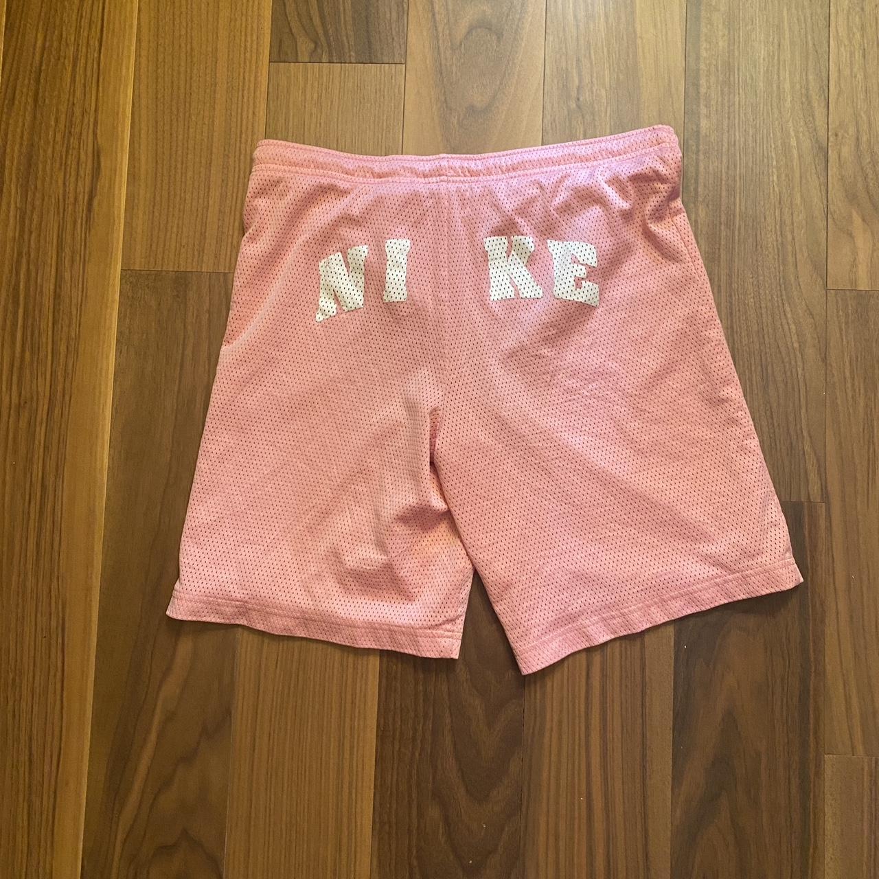 Pink shops nike basketball shorts