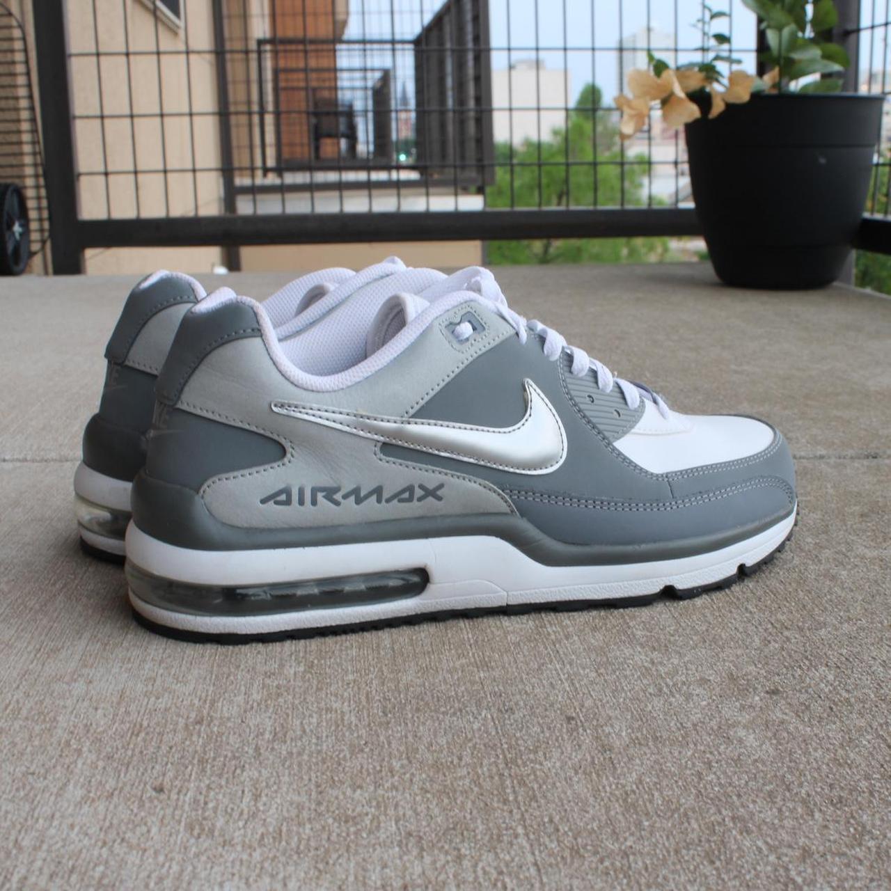 gray and white nike air