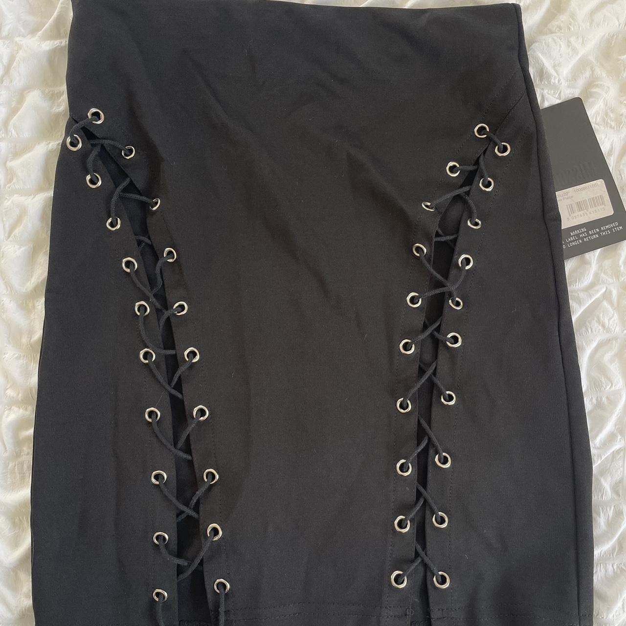 Black XS mini skirt. Still got the tags on never worn. - Depop