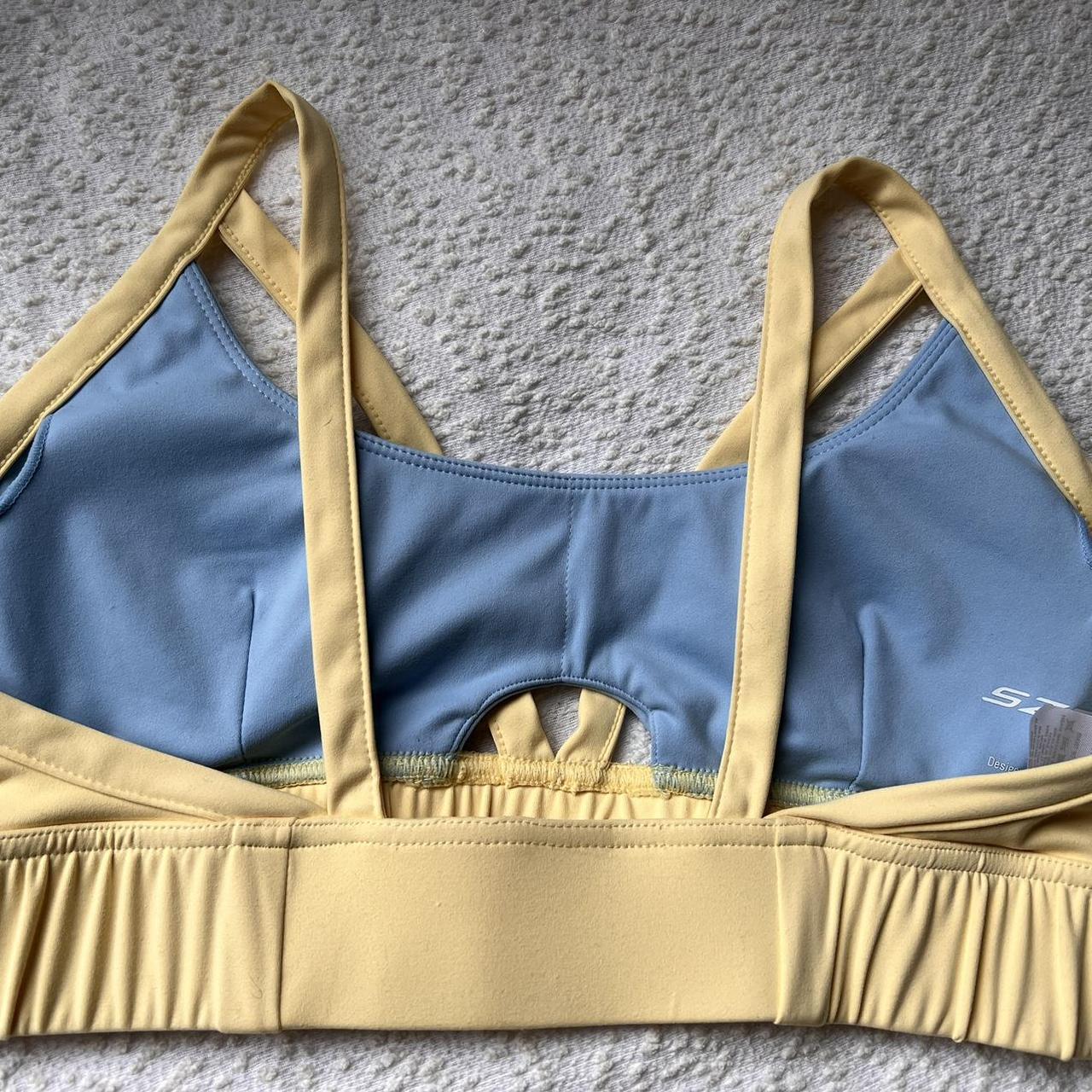 Chloe Szep Blue and yellow activewear set with... Depop