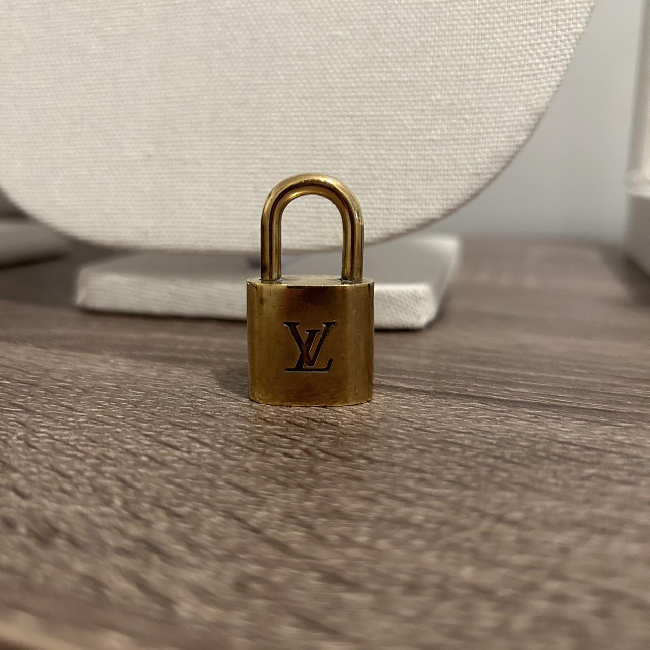 Authentic Louis Vuitton lock 🔒 If purchased I’ll... - Depop