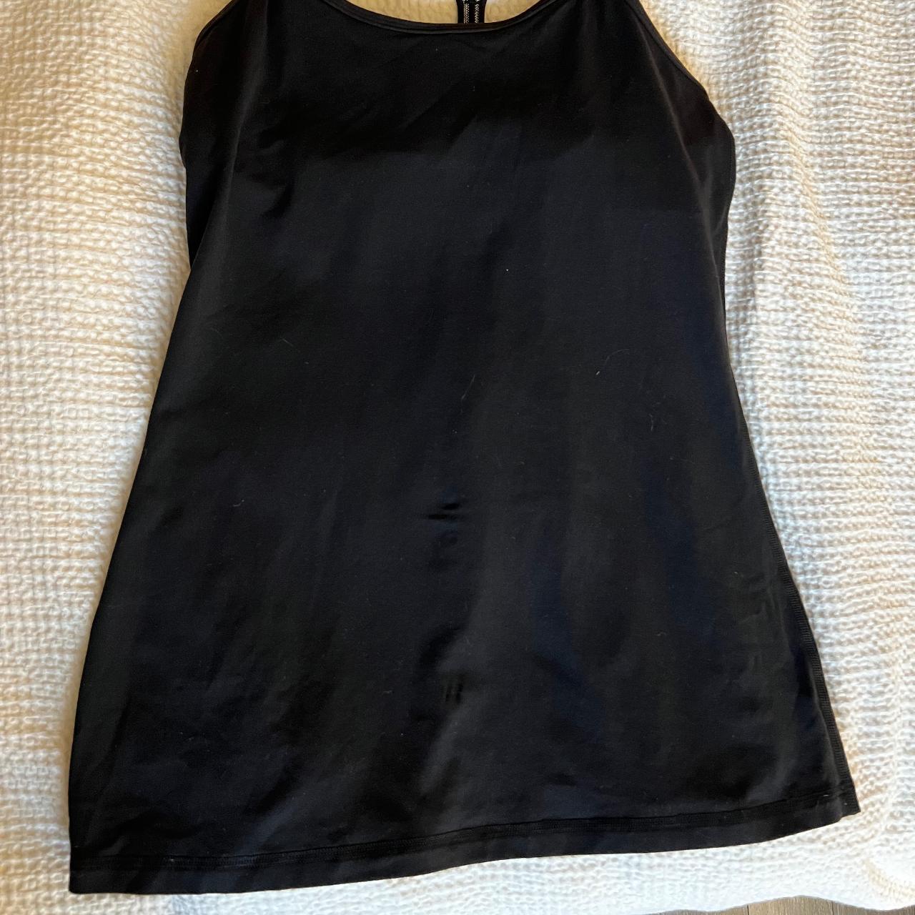 Lululemon black workout top. Built in bra. T race - Depop