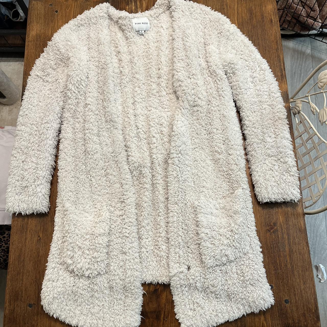 Fluffy white mid thigh length cardigan. Small hole... - Depop