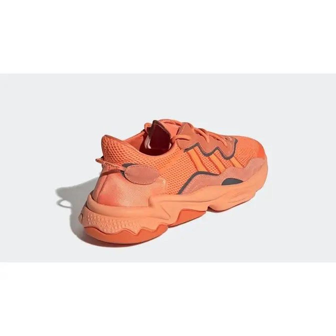 Adidas ozweego orange grade hot sale school