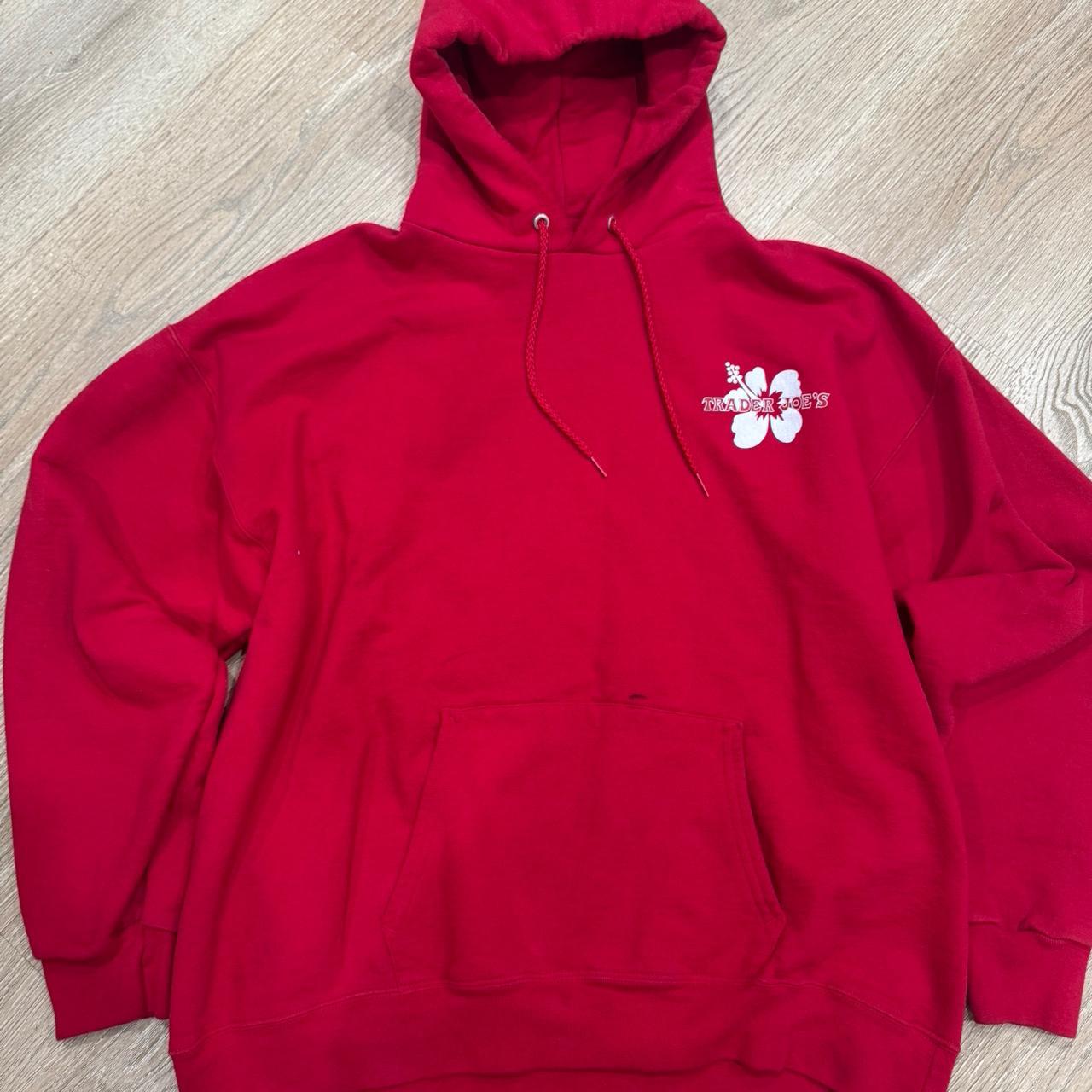 Red oversized Trader Joe’s hoodie