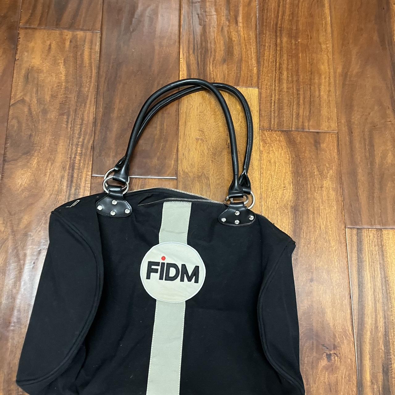 FIDM black and white duffel bag