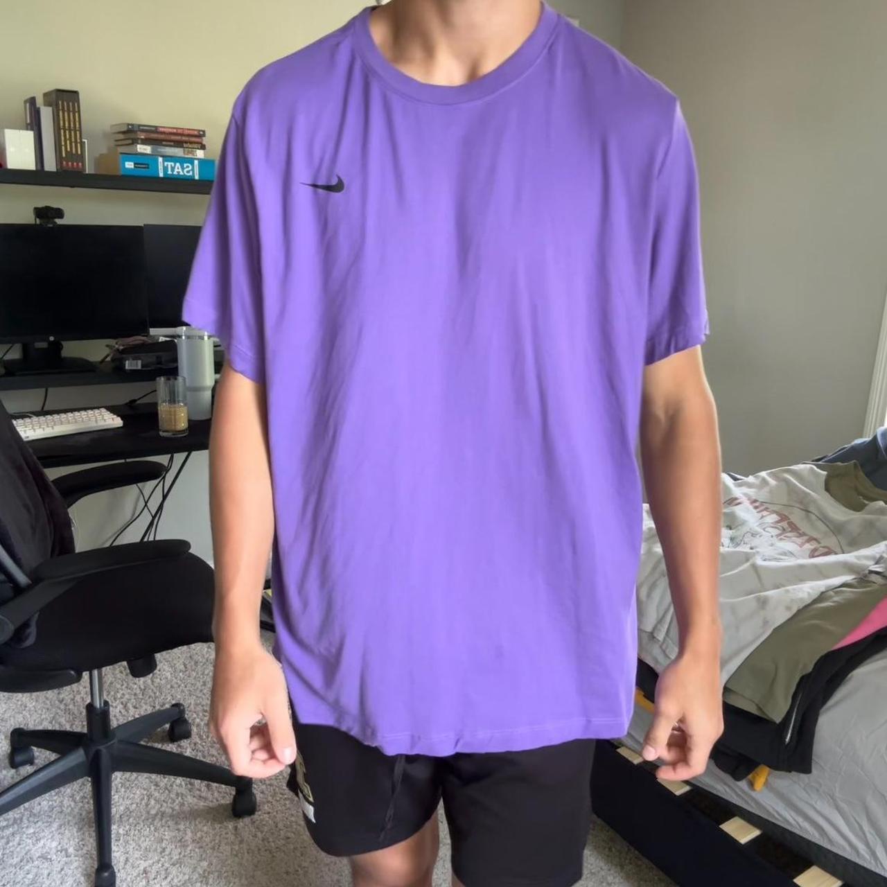 black and purple nike shirt