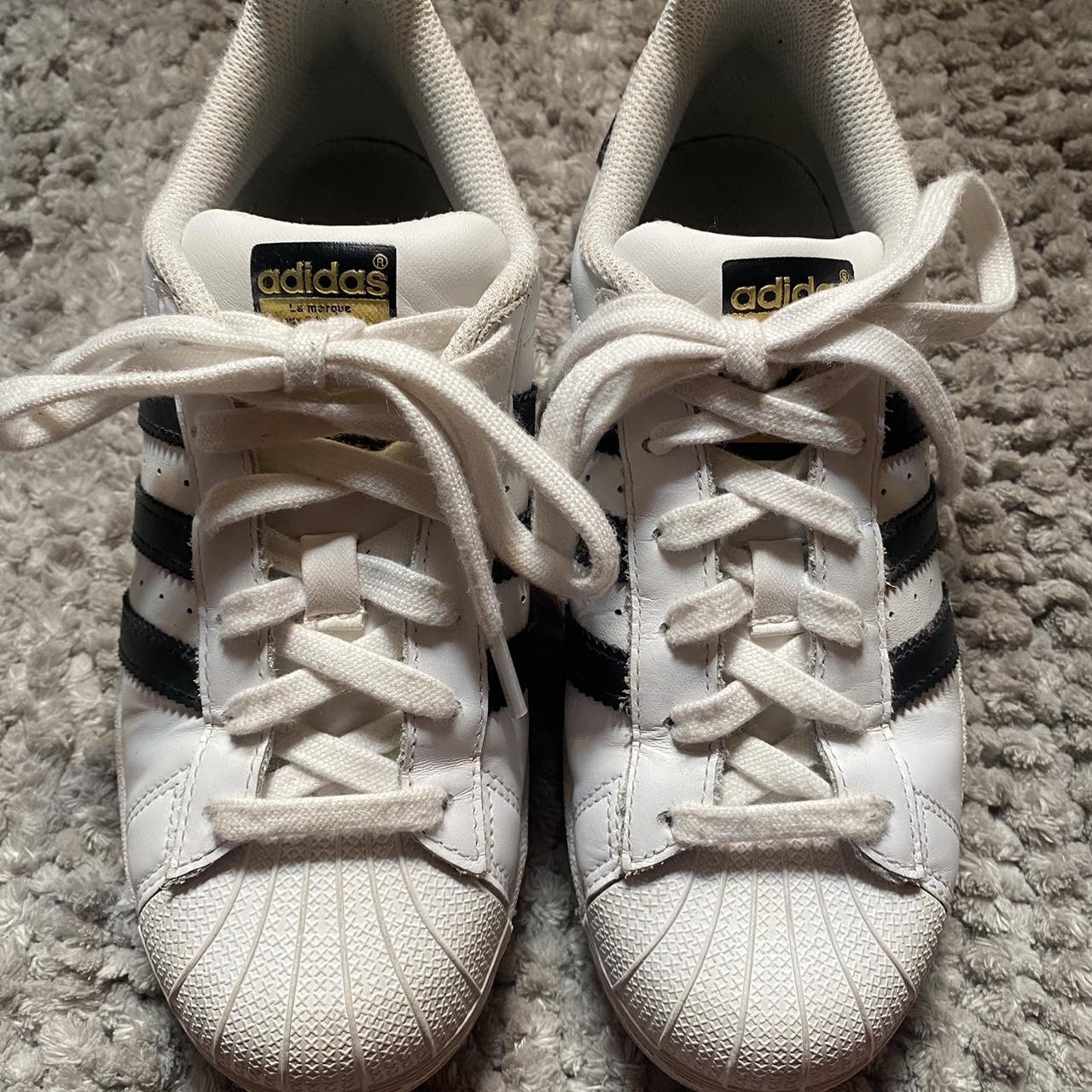 adidas superstars. size 4 youth fits about a size