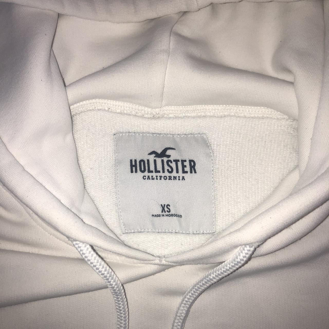 Hollister white cropped hoodie Super comfy and... - Depop