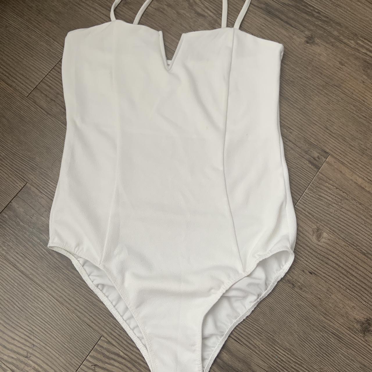 White plunge v-neck body suit (with buttons at the... - Depop